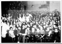  Postkarte - Weihnachtsfeier in einem Umsiedlungslager 1940